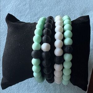 Set of 4 Stretch Mint Green, white, & Black Beaded Bracelets